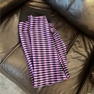 Women’s Black And Purple Leggings
Size Large